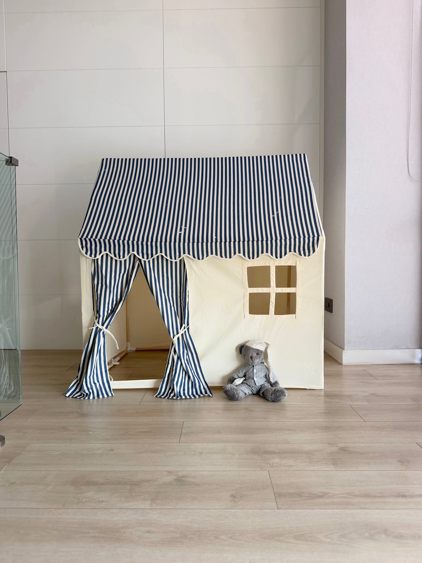 House tent with stripes