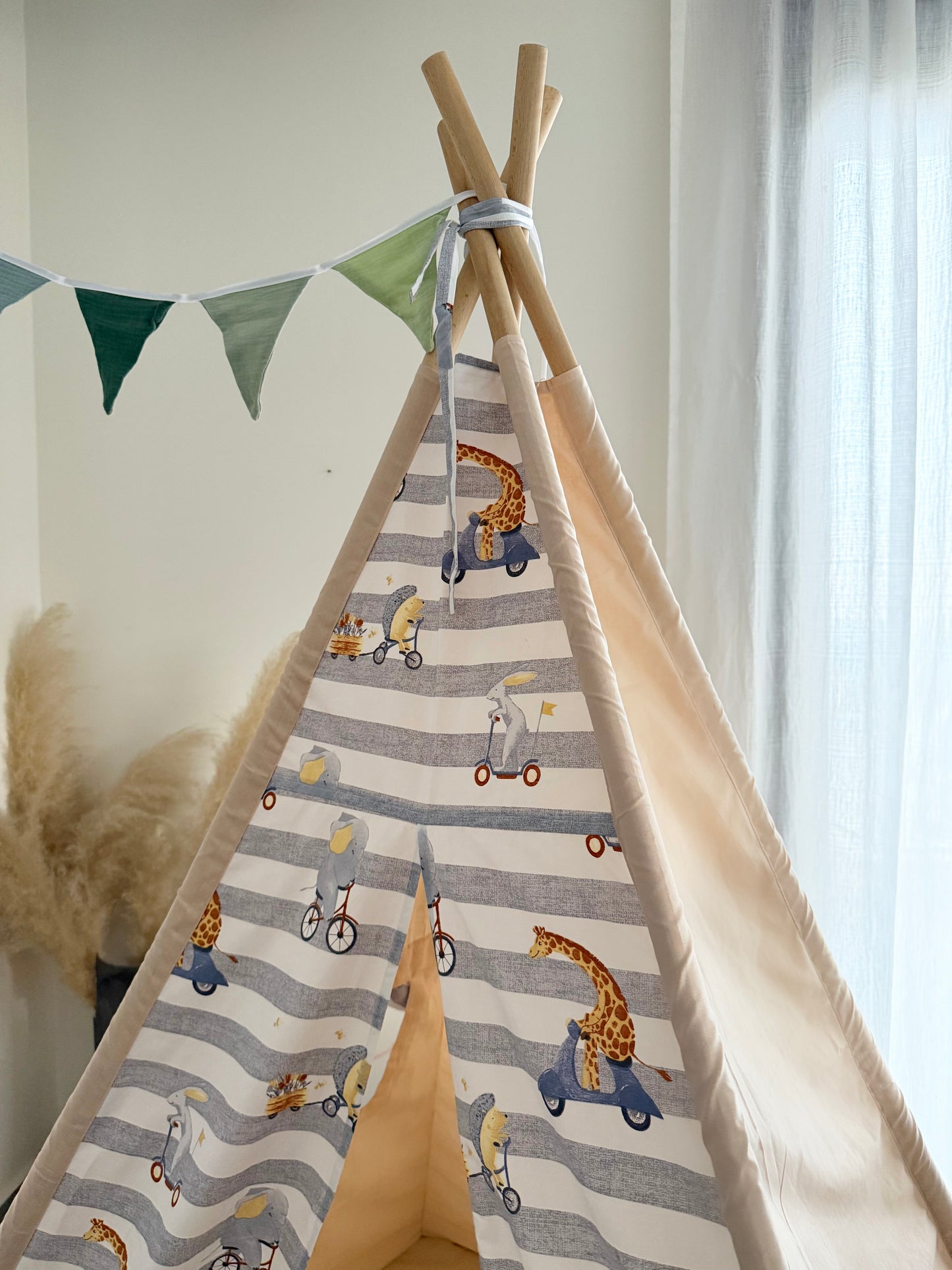 Teepee Giraffe on the Bike