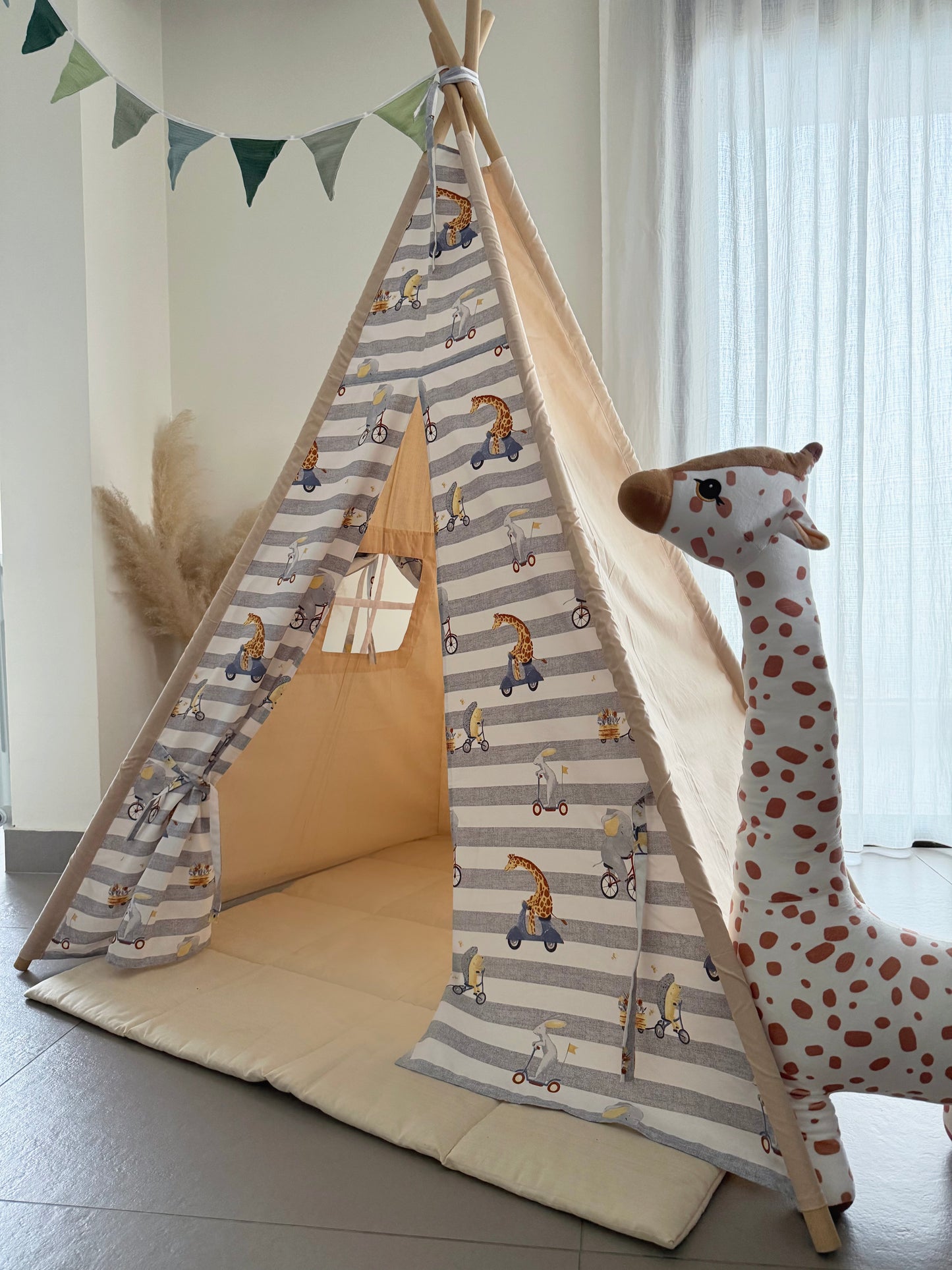 Teepee Giraffe on the Bike